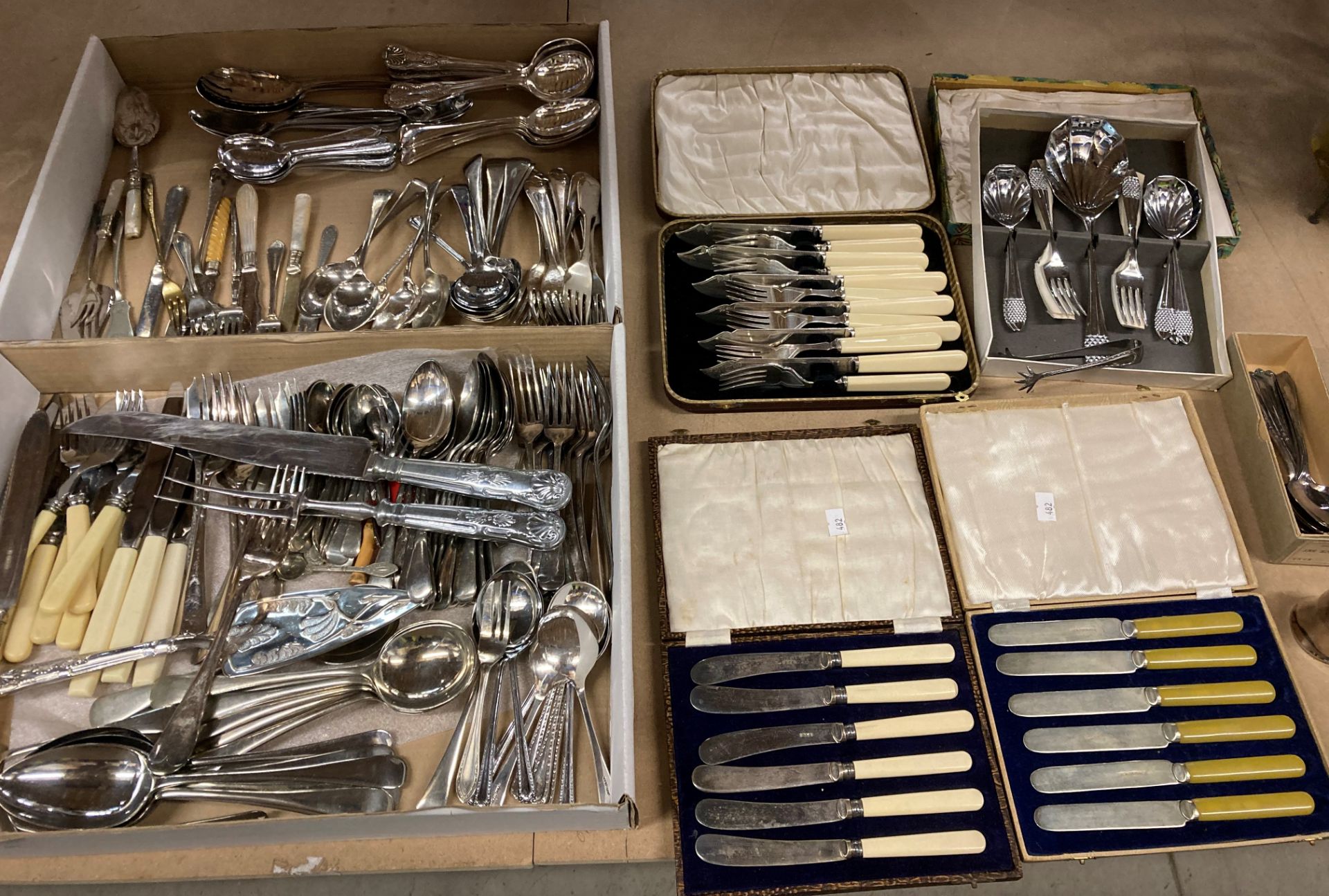 A large quantity of EPNS and stainless steel cutlery including EPNS cased fish knives and forms,