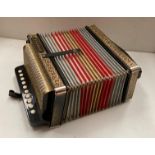 An M Hohner West German steel reeded accordion Further Information Key: C