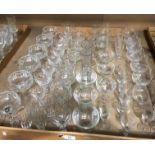 Glassware - 50+ assorted drinking glasses and stemmed sundae dishes,