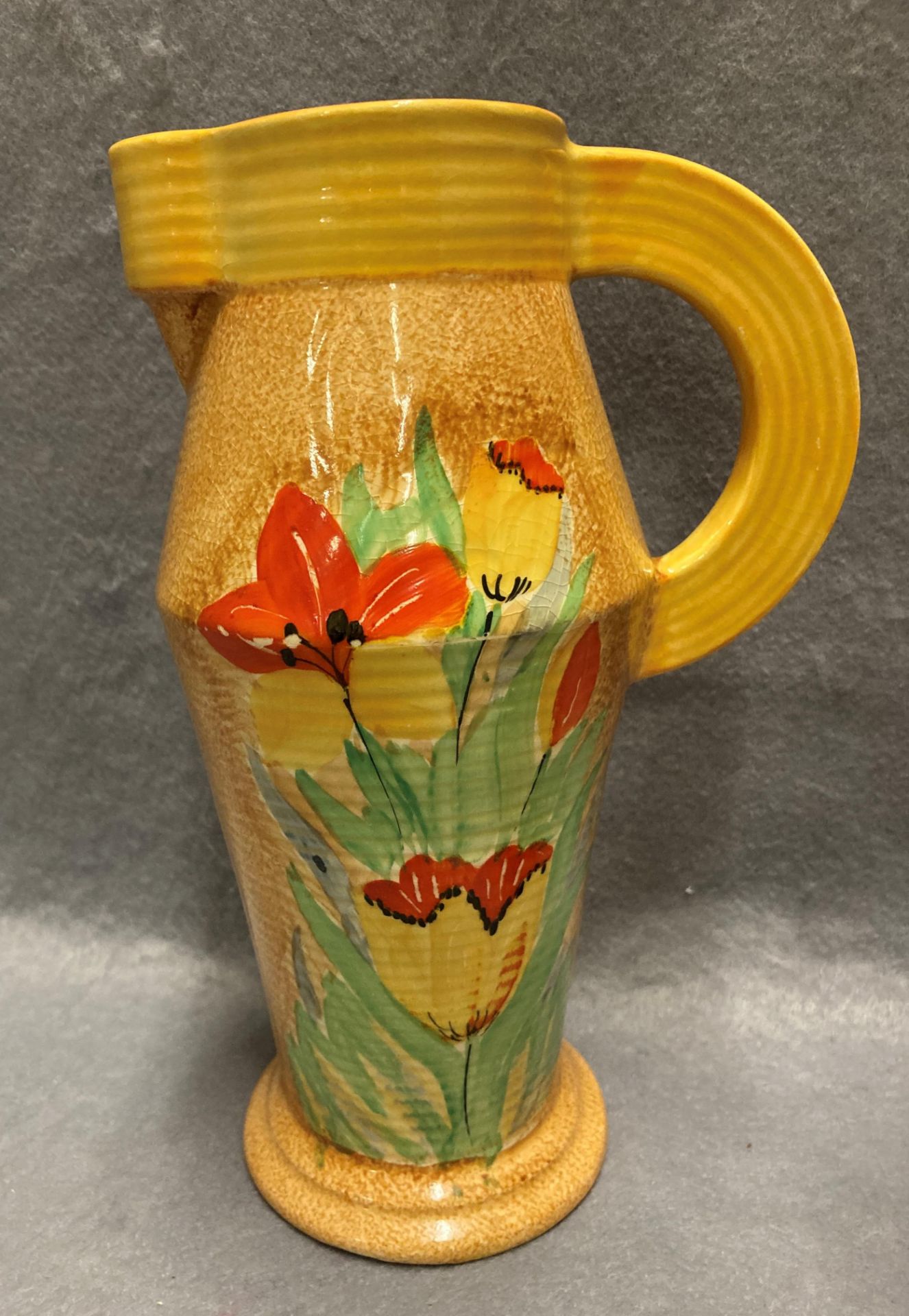 A Shelley jug in orange, yellow and brown, together with a Wadeheath jug with floral decoration, no. - Image 3 of 5