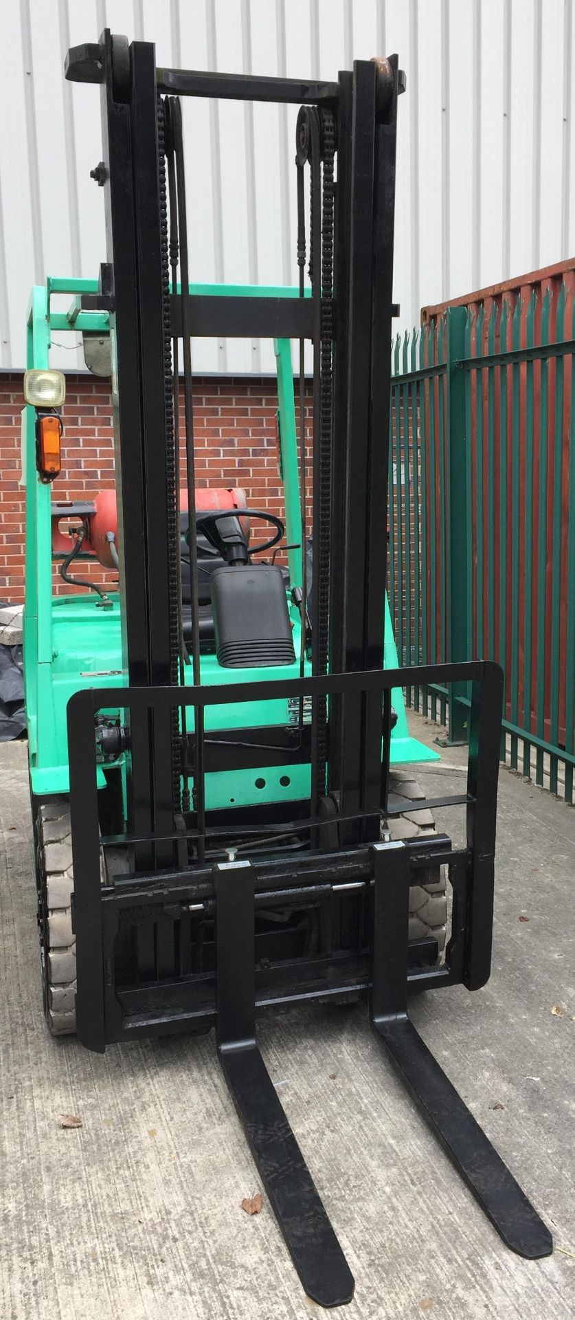 A MITSUBISHI FG20 TWO TONNE GAS FORKLIFT TRUCK with Cascade side shift - colour green.