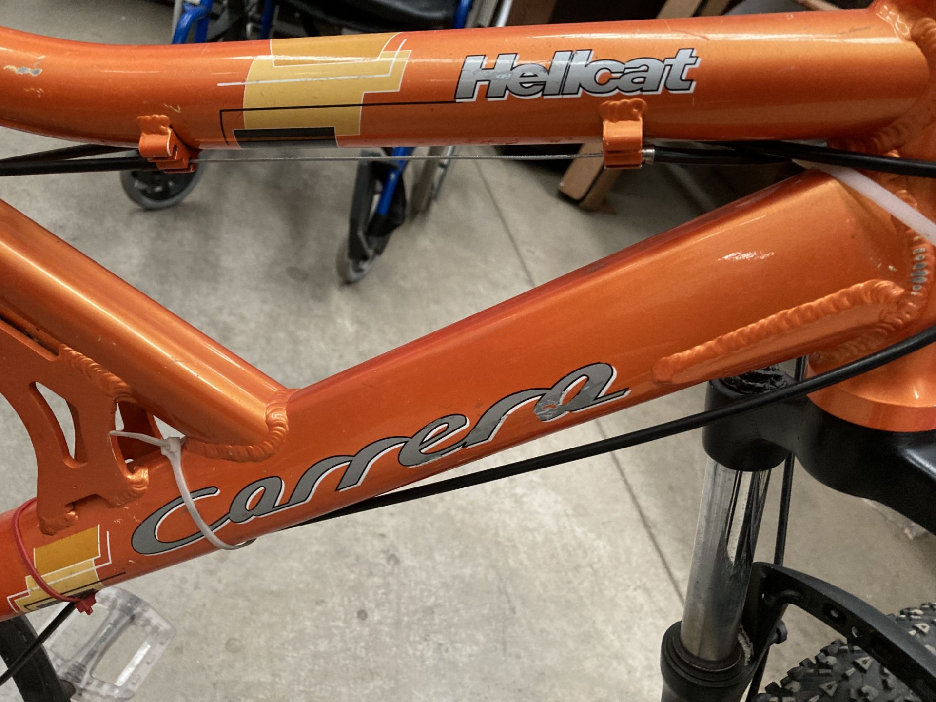 A Carrera Hellcat Shimano Diore 18 speed front and rear suspension mountain bike in orange with - Image 2 of 3