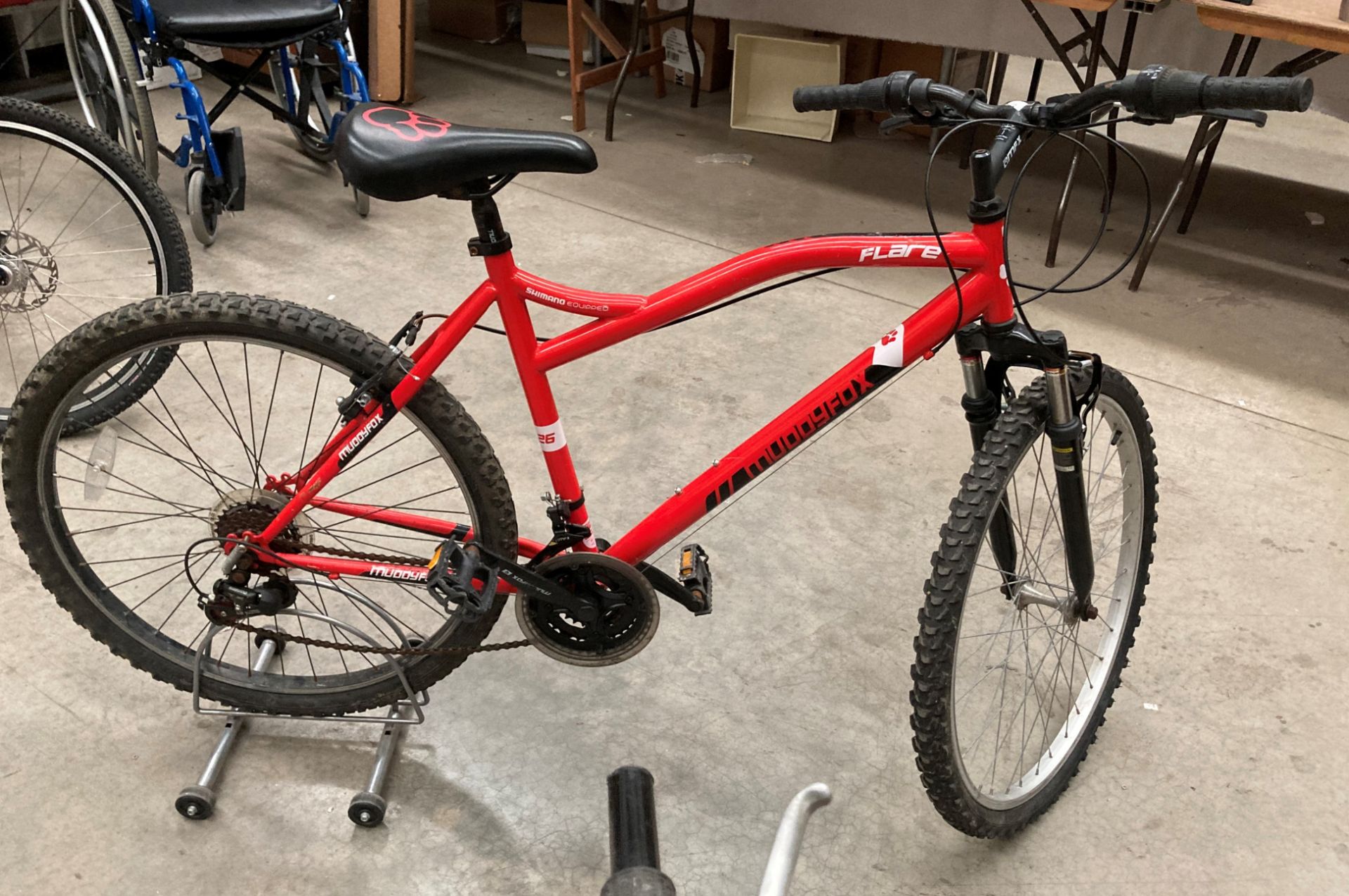 A Muddy Fox Flare 18 speed mountain bike in red - 20 " frame