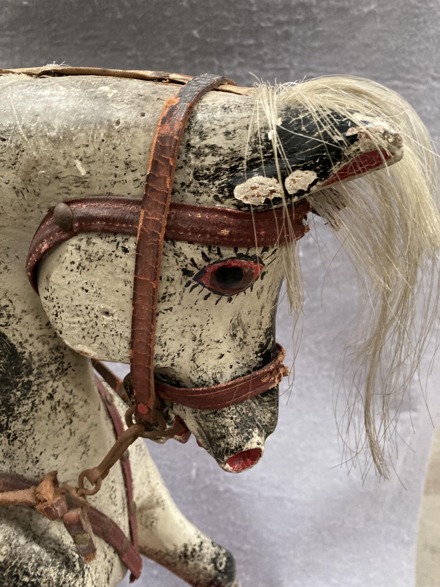 An old dapple grey composition rocking horse on red painted wooden frame, length approximately 80cm, - Image 8 of 12