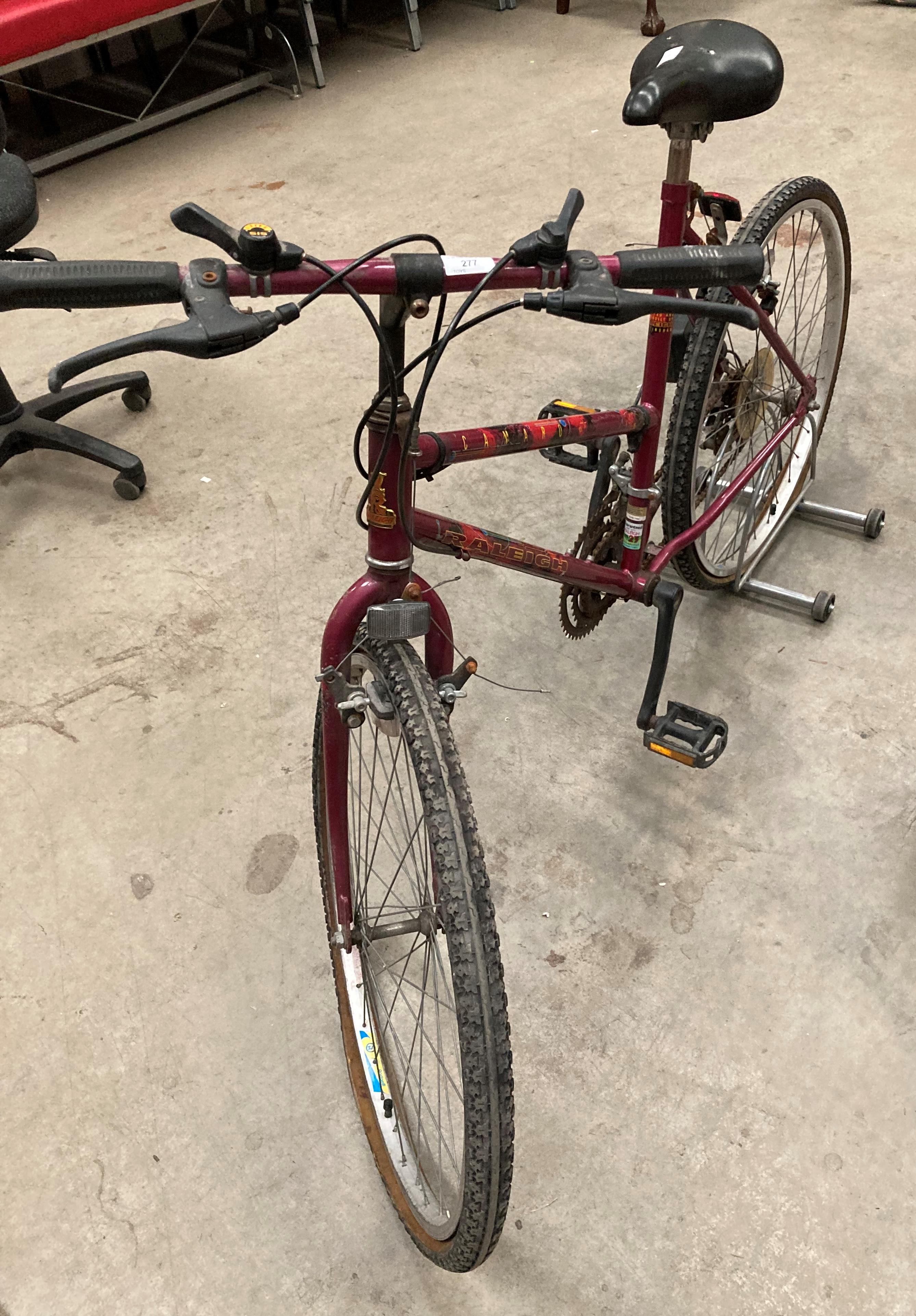 A Raleigh Camaro 15 speed ladies bicycle in purple