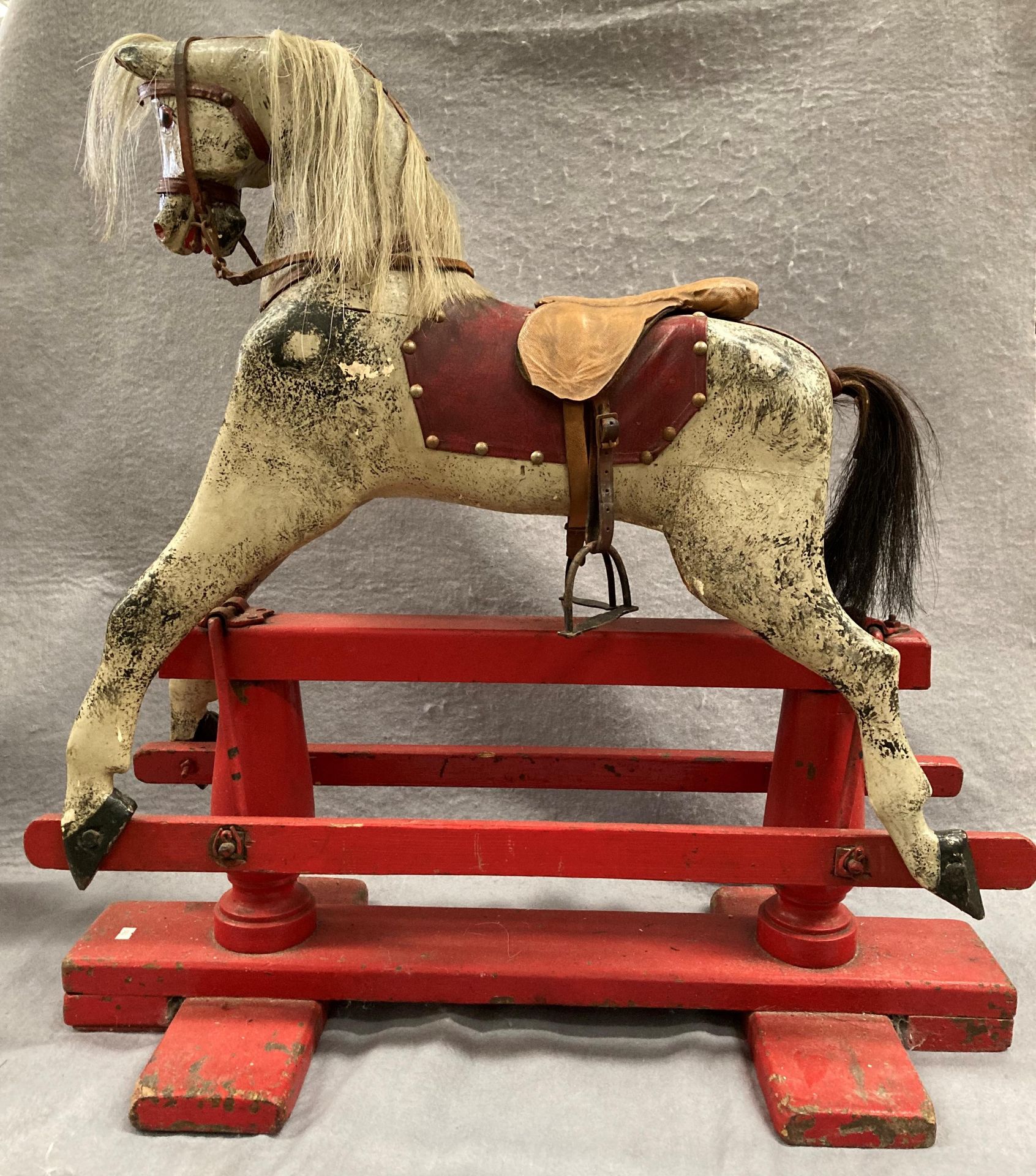 An old dapple grey composition rocking horse on red painted wooden frame, length approximately 80cm, - Image 12 of 12