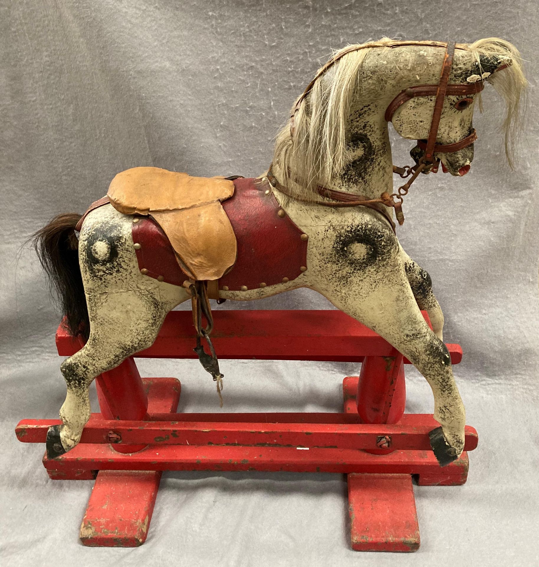 An old dapple grey composition rocking horse on red painted wooden frame, length approximately 80cm, - Image 6 of 12