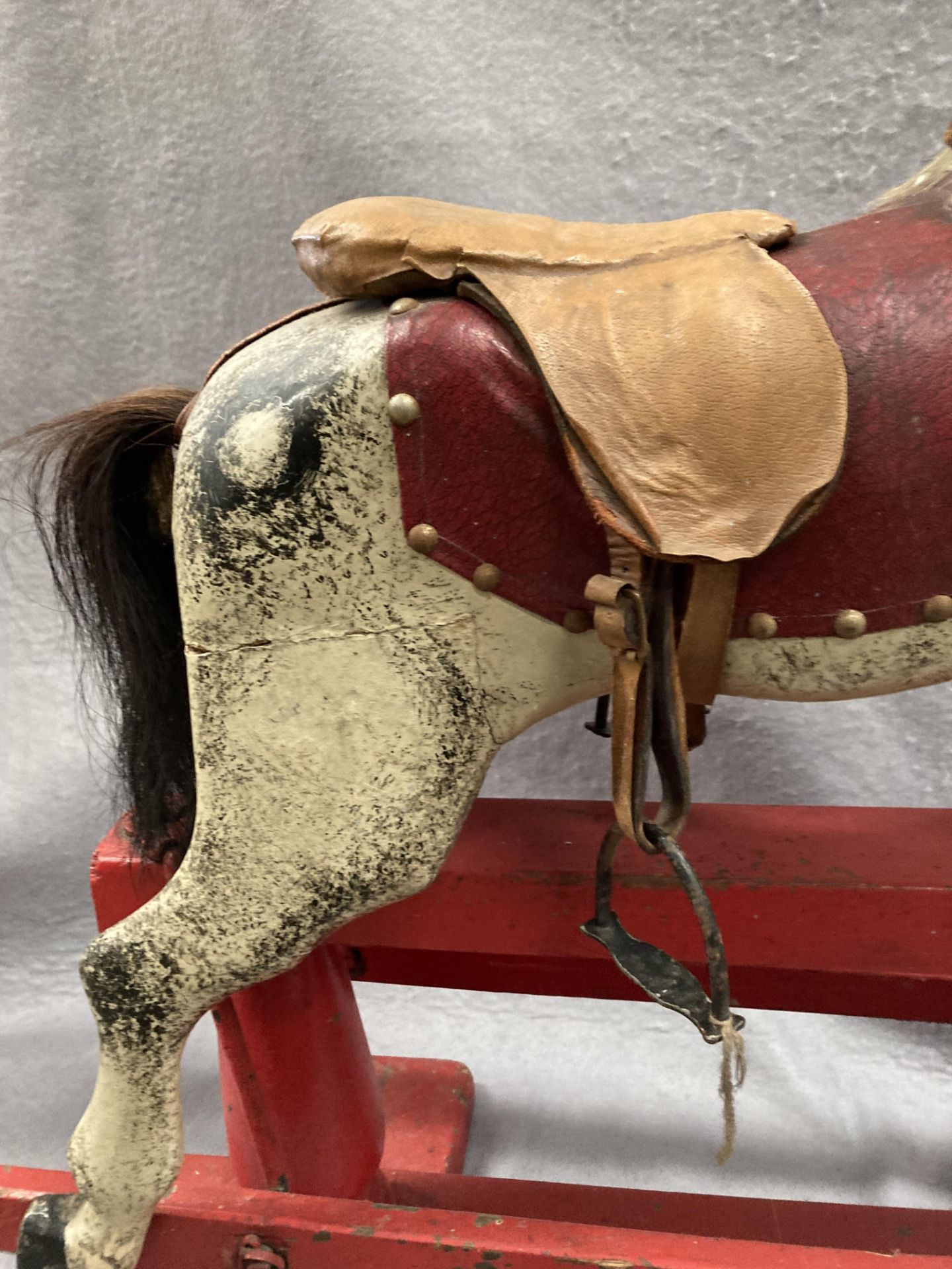 An old dapple grey composition rocking horse on red painted wooden frame, length approximately 80cm, - Image 7 of 12