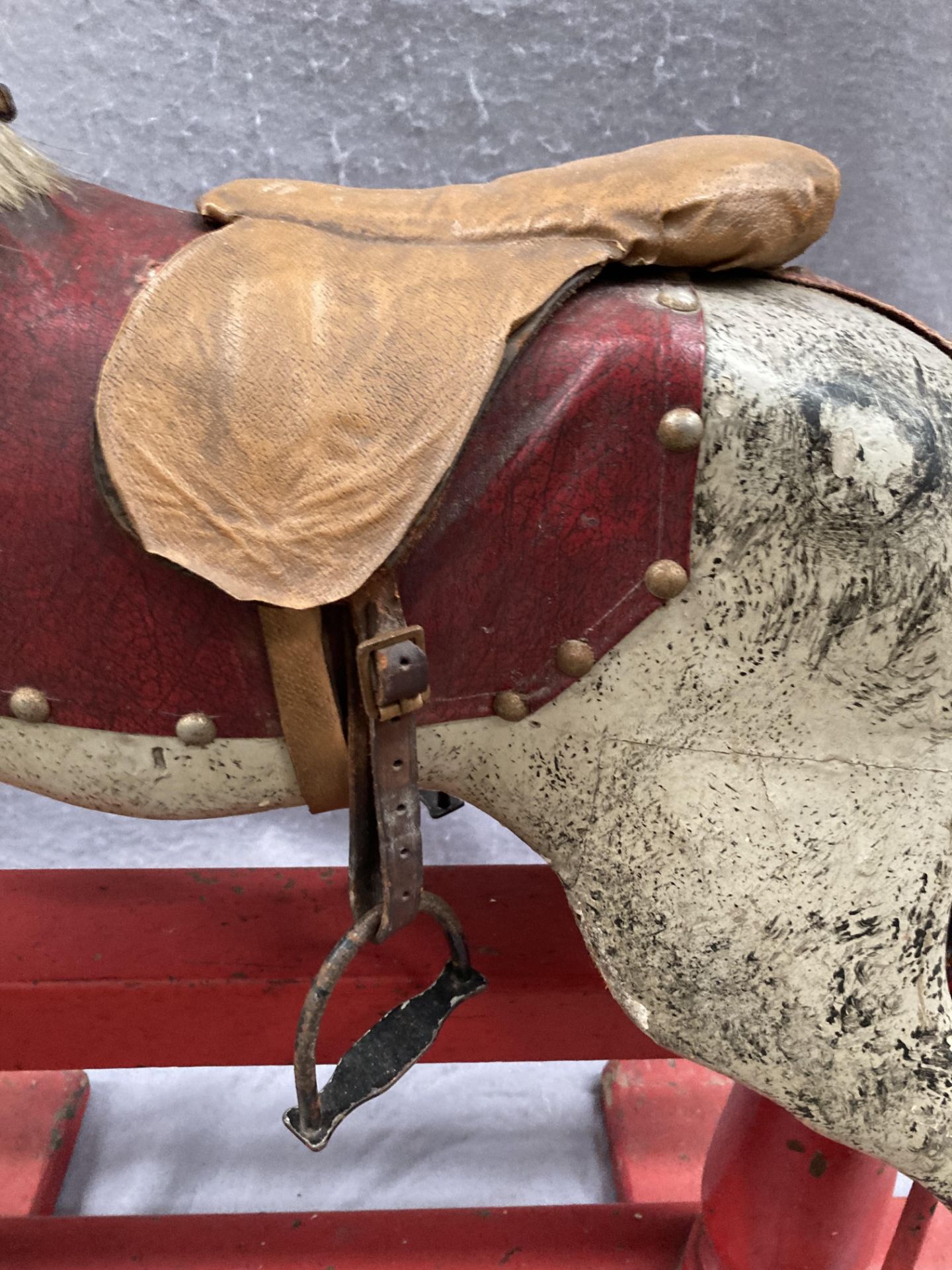 An old dapple grey composition rocking horse on red painted wooden frame, length approximately 80cm, - Image 11 of 12