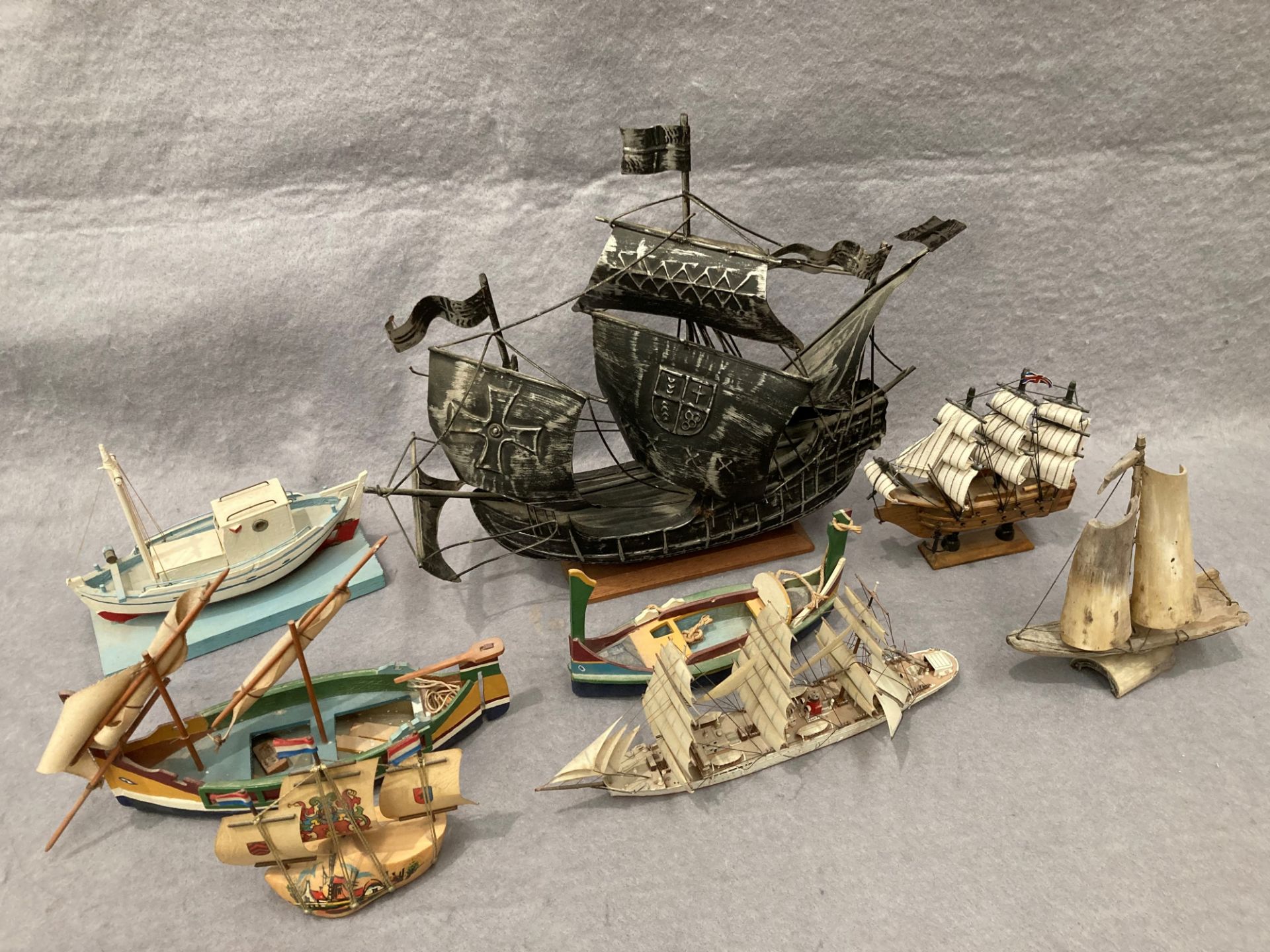 Eight assorted model hand made boats and ships