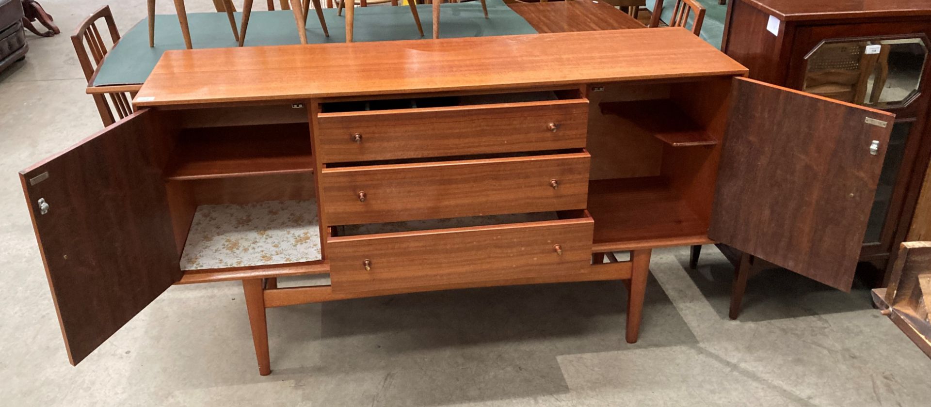 A Gordon Russell Bromley Works 1950s/1960s teak dining suite comprising extending dining table (one - Image 3 of 6