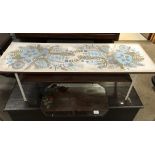 A formica topped with floral pattern 1960s metal framed coffee table with undertray,