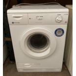 A White Knight 767C 7kg reverse tumble dryer