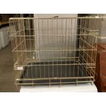 A portable animal cage 60 x 45 x 50cm high