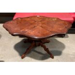 An Italian style shaped coffee table with inlaid top 100 x 60cm