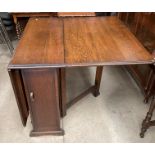 An oak single side drawer and door drop leaf dining table 90 x 156cm when open