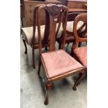 Two mahogany Queen Anne style dining chairs with pink upholstered seats