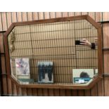 A wood octagonal framed wall mirror - 56 x 80cm