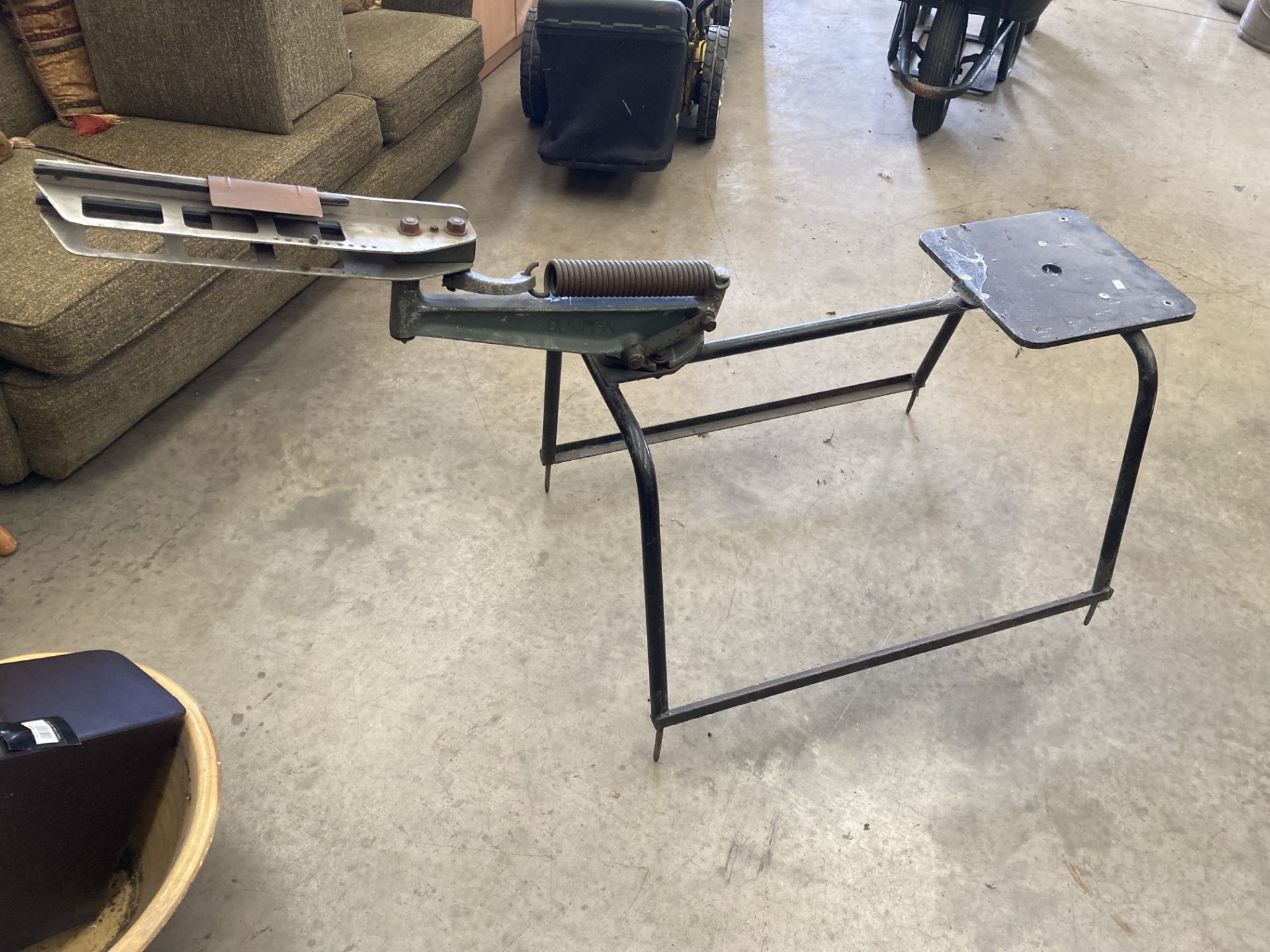 BOWMAN clay pigeon launcher on a black metal frame