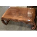 A Chinese hardwood coffee table on curved legs 80 x 42cm