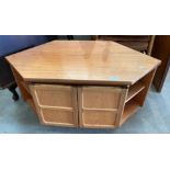 A Nathan teak two door shaped entertainment stand