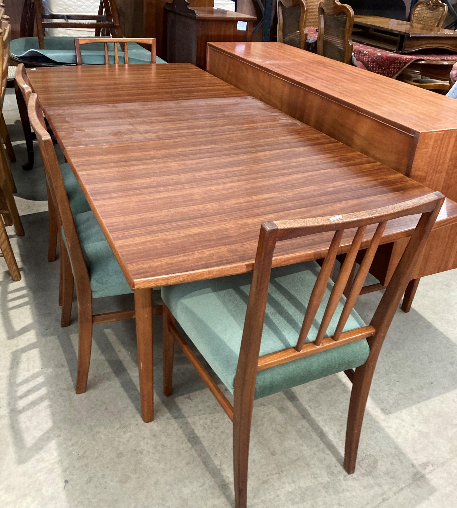A Gordon Russell Bromley Works 1950s/1960s teak dining suite comprising extending dining table (one - Image 5 of 6