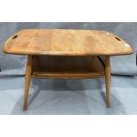 An Ercol blond elm coffee table with undertray 73 x 45cm - top marked