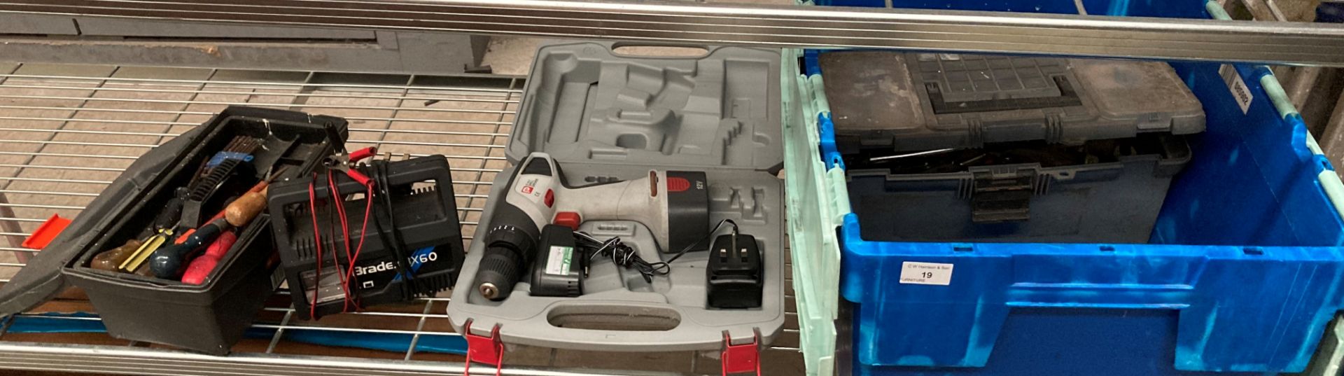 A Pro 12 volt drill driver complete with battery and charger in case,