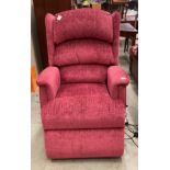 An HSL dark pink electrically operated recliner armchair with control unit Further