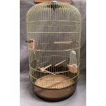 A birdcage with domed top approximately 70cm high x 40cm dia