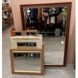 A wood framed wall mirror 97 x 66cm and three other smaller wall mirrors (4)