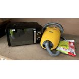 A Breville B17E9CMSB microwave oven and a Goblin Aztec 1200 vacuum cleaner (2)