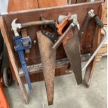 A tool rack and contents - stillson,