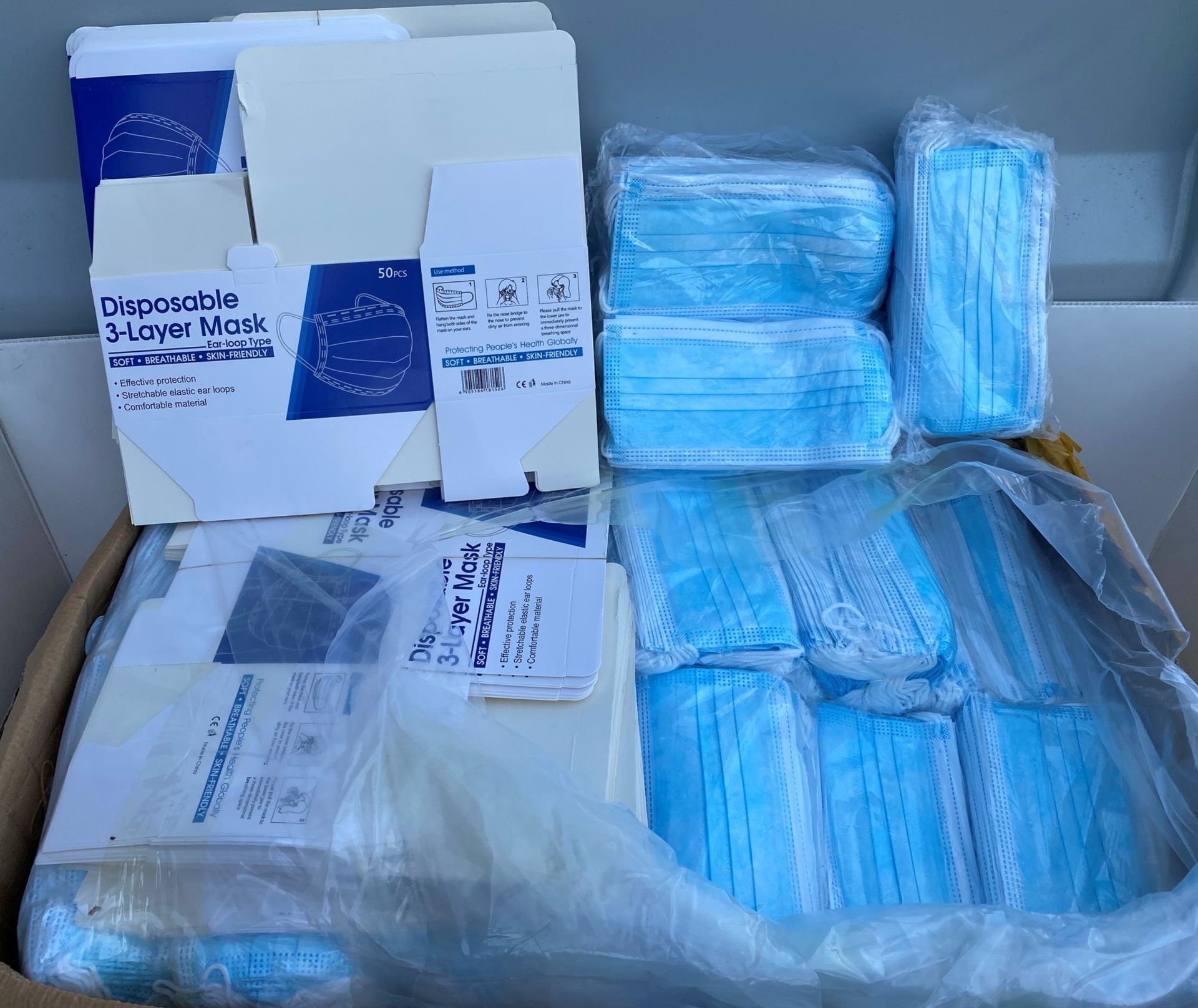 6000 x Disposable 3-layer face masks - blue/white masks sealed in packets and box contains flatpack
