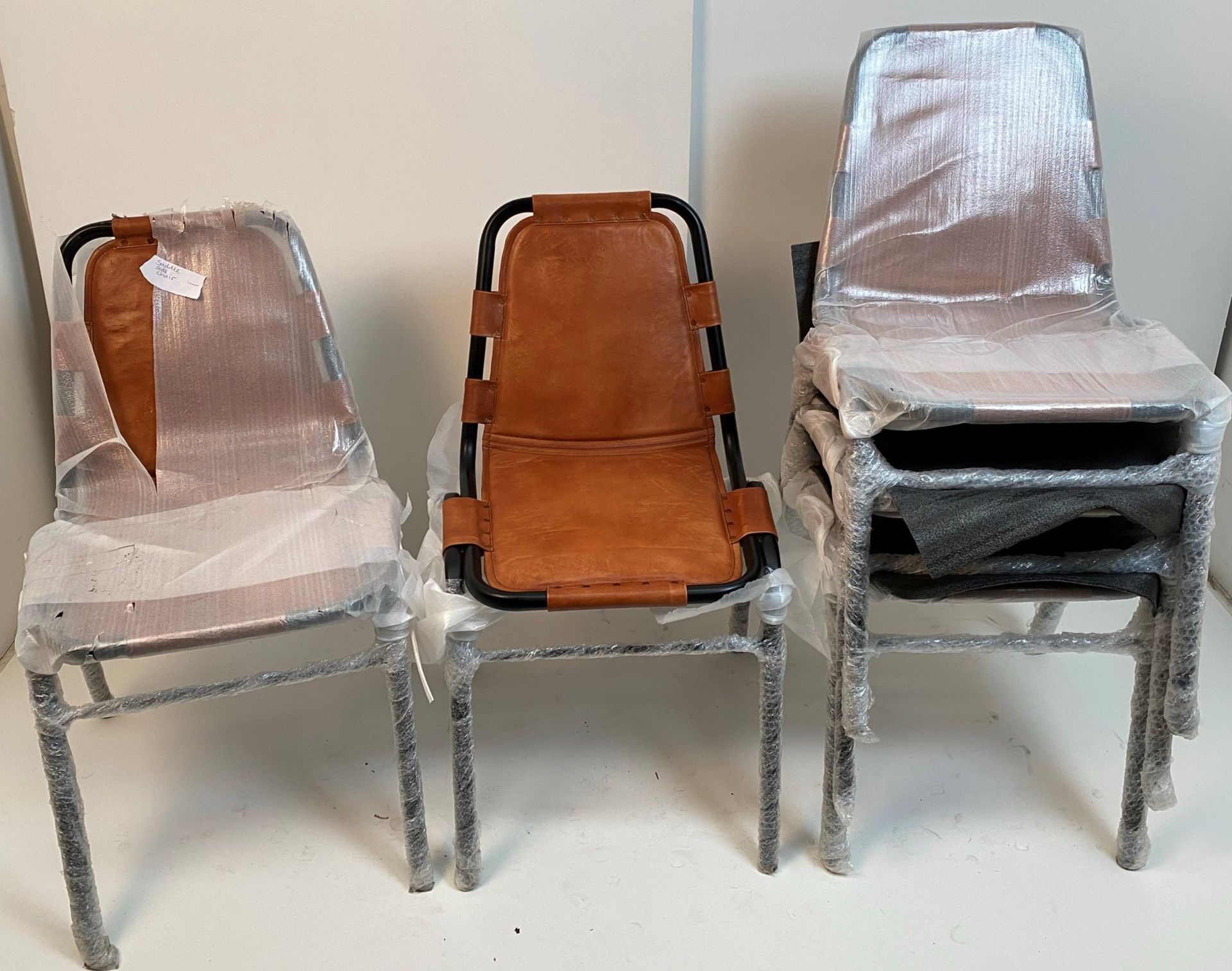 4 x Black Metal Framed Brown Leather Saddle Chairs - (boxed) plus one additional matching chair - Image 2 of 3