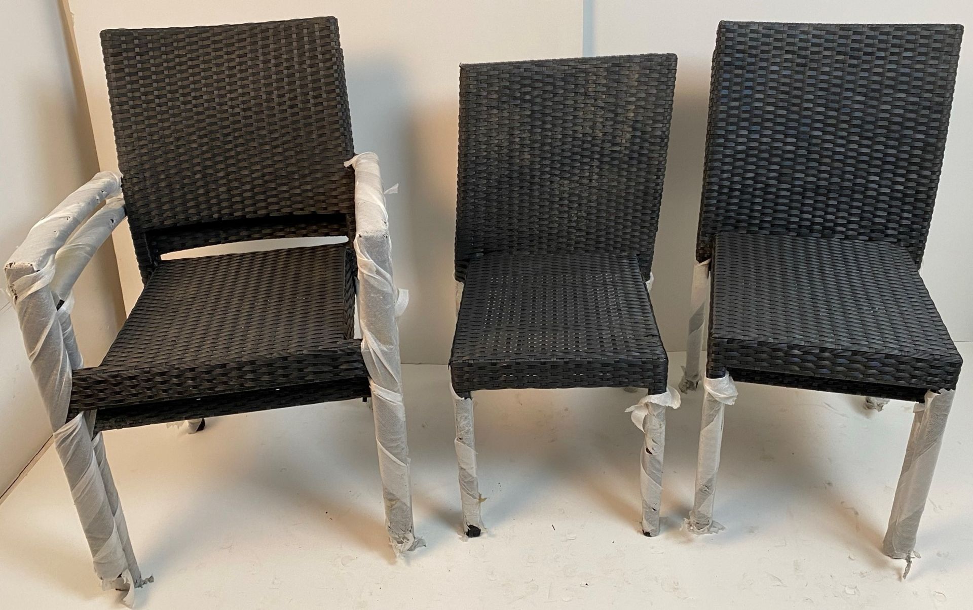 5 x Rattan Chairs - 2 x Armchairs and 3 x Chairs - One appears to be bent - As Seen