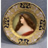 A Royal Vienna porcelain portrait china cabinet plate depicting a young female, 25cm diameter,