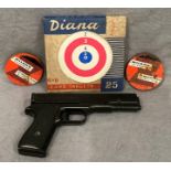 A Diana Repeater air pistol complete with two tins of .