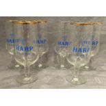 Six vintage Harp Lager stemmed glasses