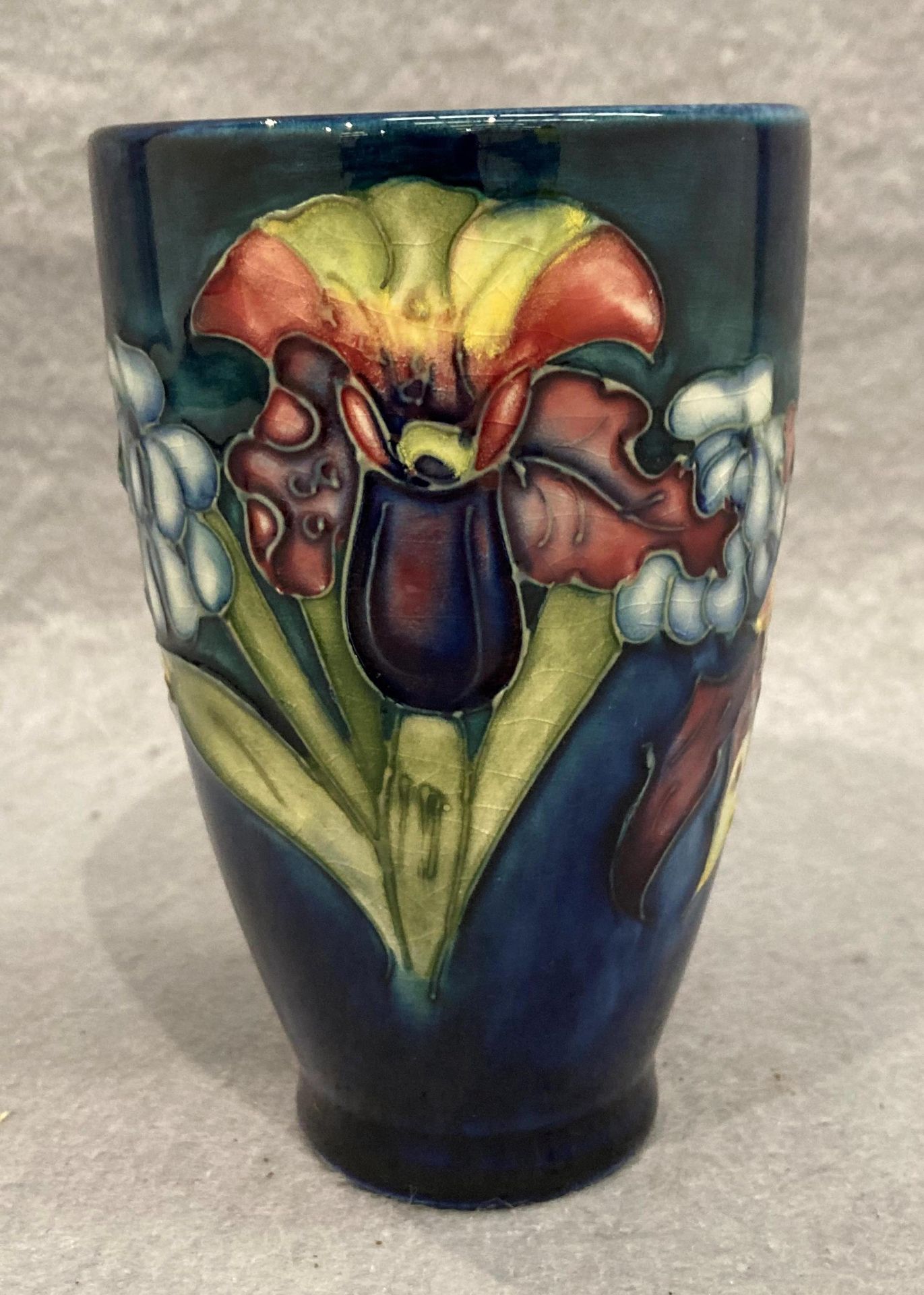 A Moorcroft blue glazed vase,
