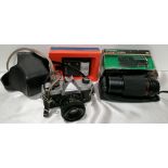 A Fujica STX-1 camera in bag with Fuji 1=55mm lens,