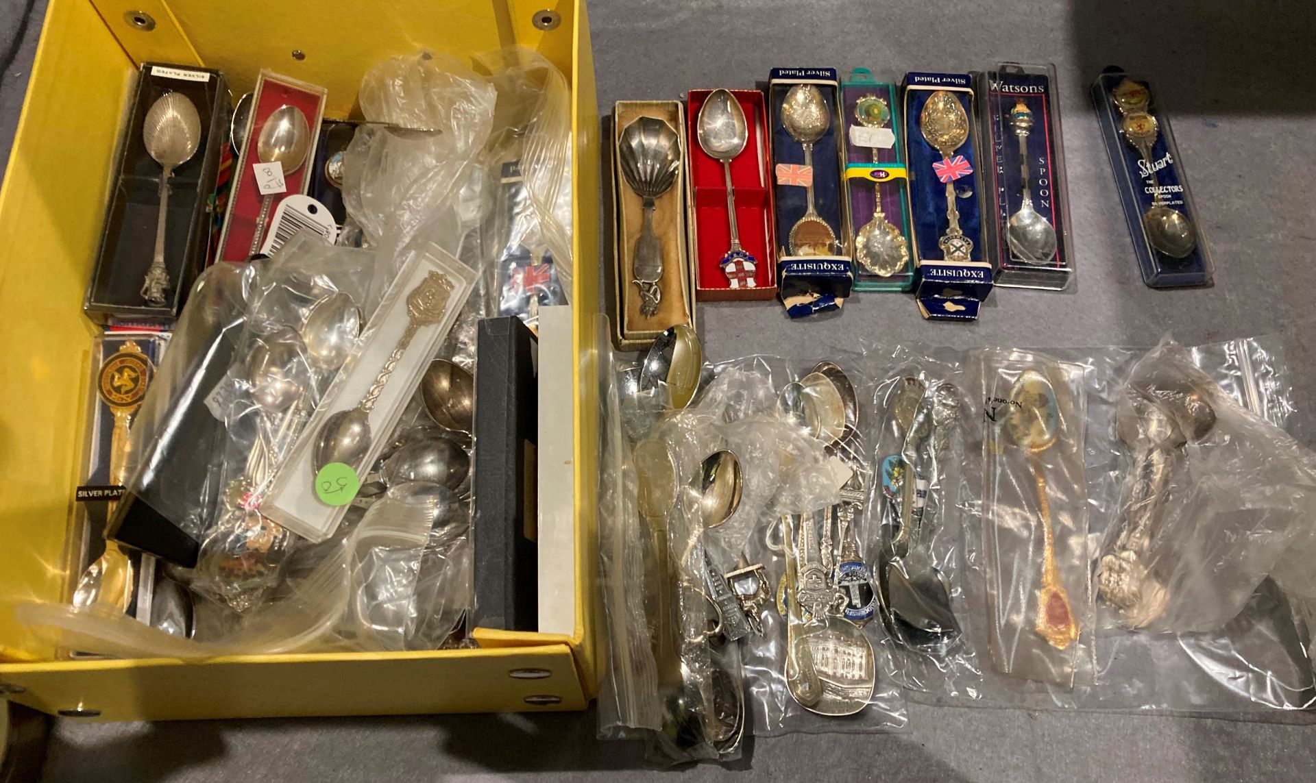 Contents to yellow box - large quantity of silvered plated and other souvenir teaspoons - mainly