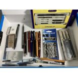 Contents to tray - a Penquest three pen set (boxed), a Cross fountain pen in blue,