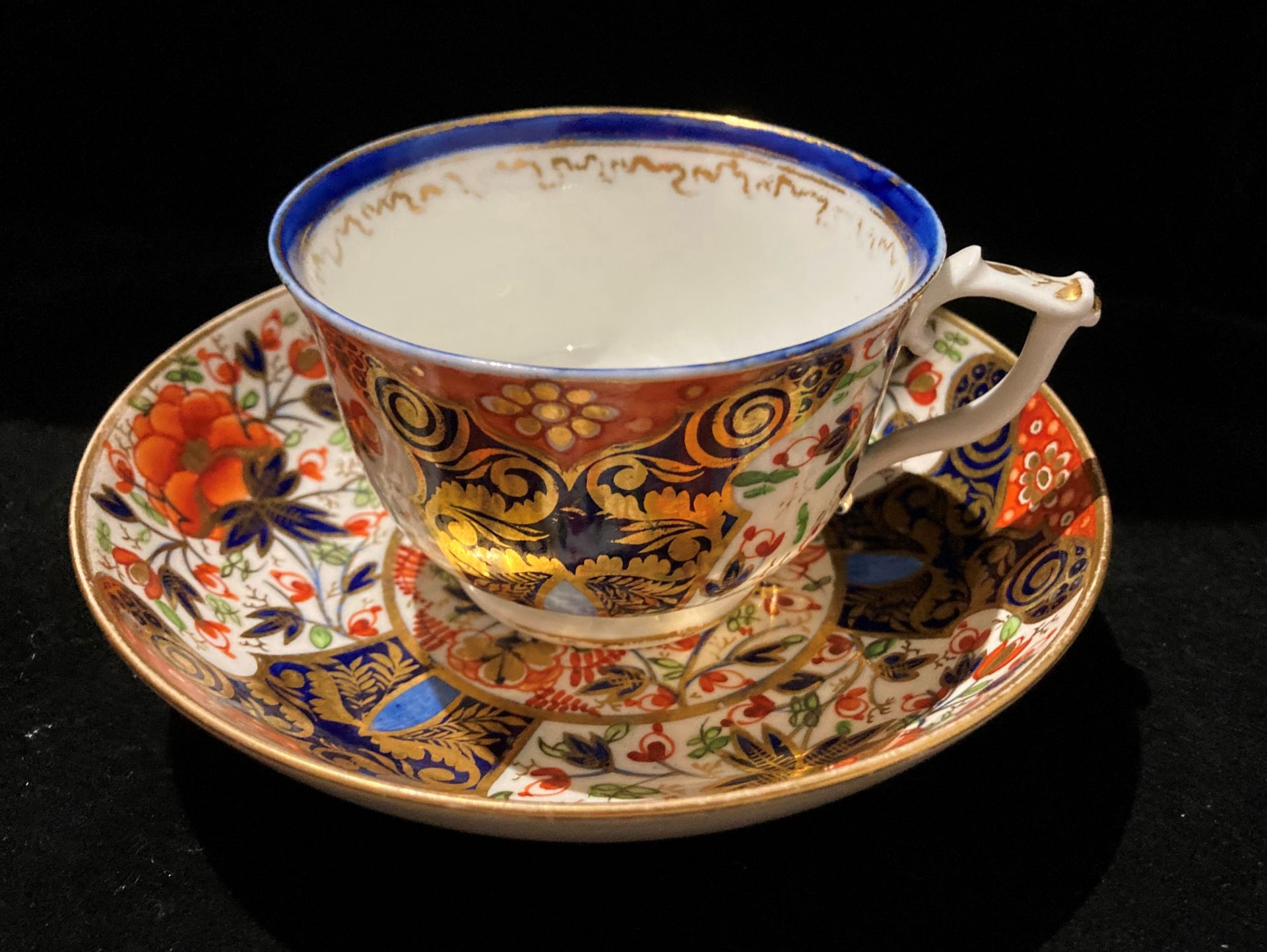 A Derby Imari patterned early 19th century cup and saucer