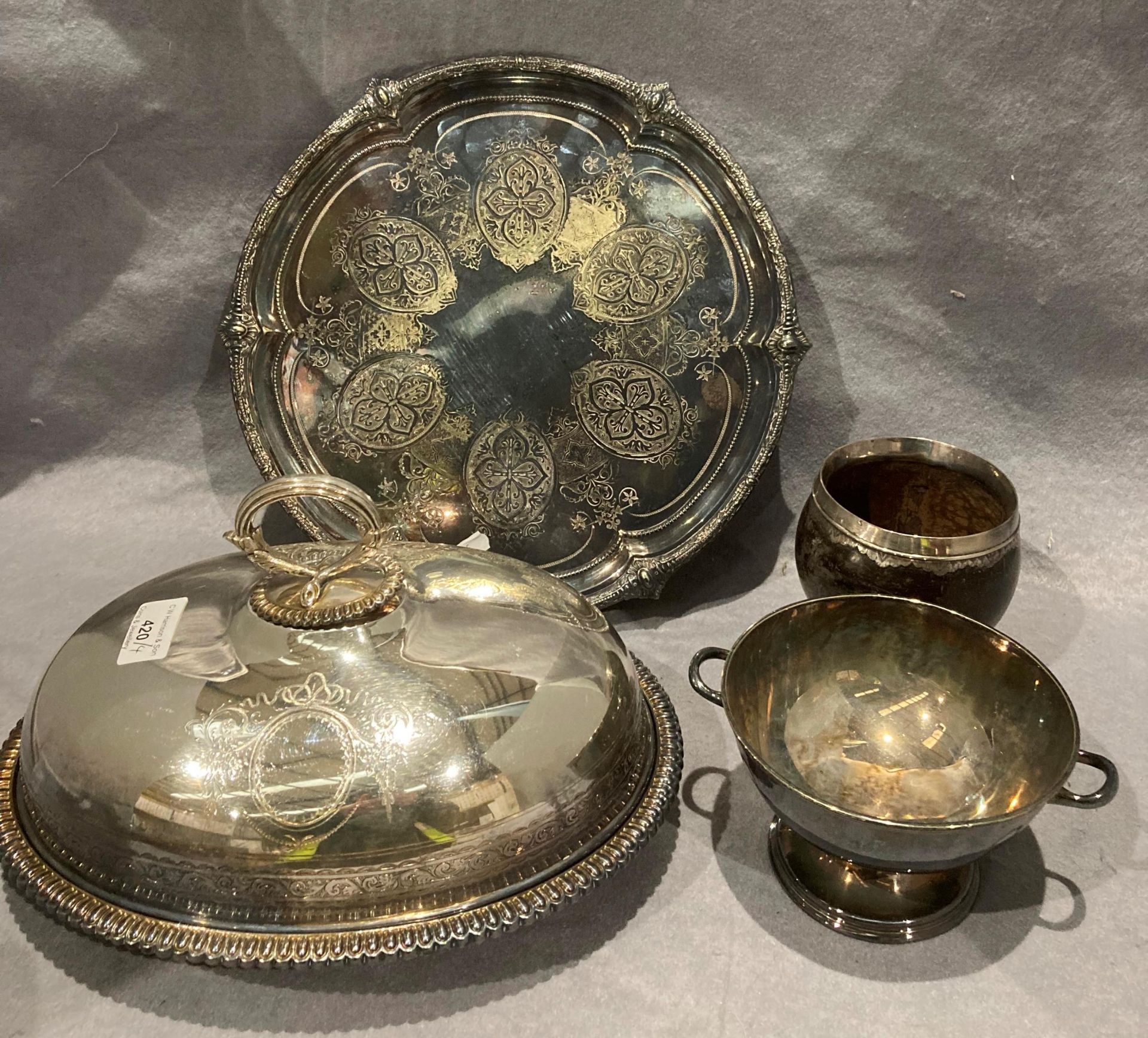 A silver plated circular tray,