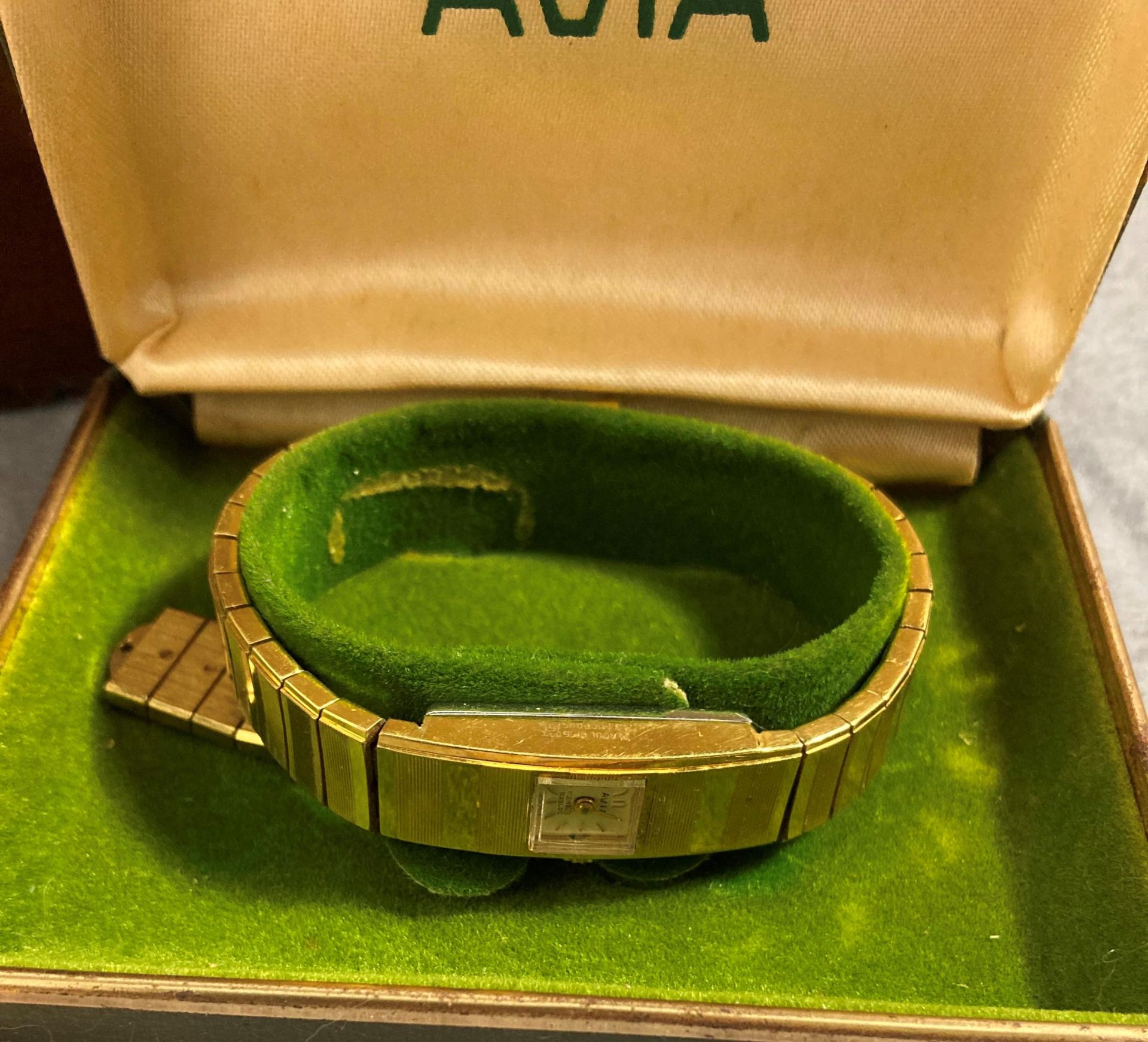 A small wooden jewellery box with Avia gold plated lady's wristwatch and small quantity costume - Image 2 of 3