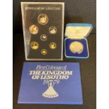 A Kingdom of Lesotho 50 Maloti 1980 Silver coin together with a First Coining of The Kingdom of