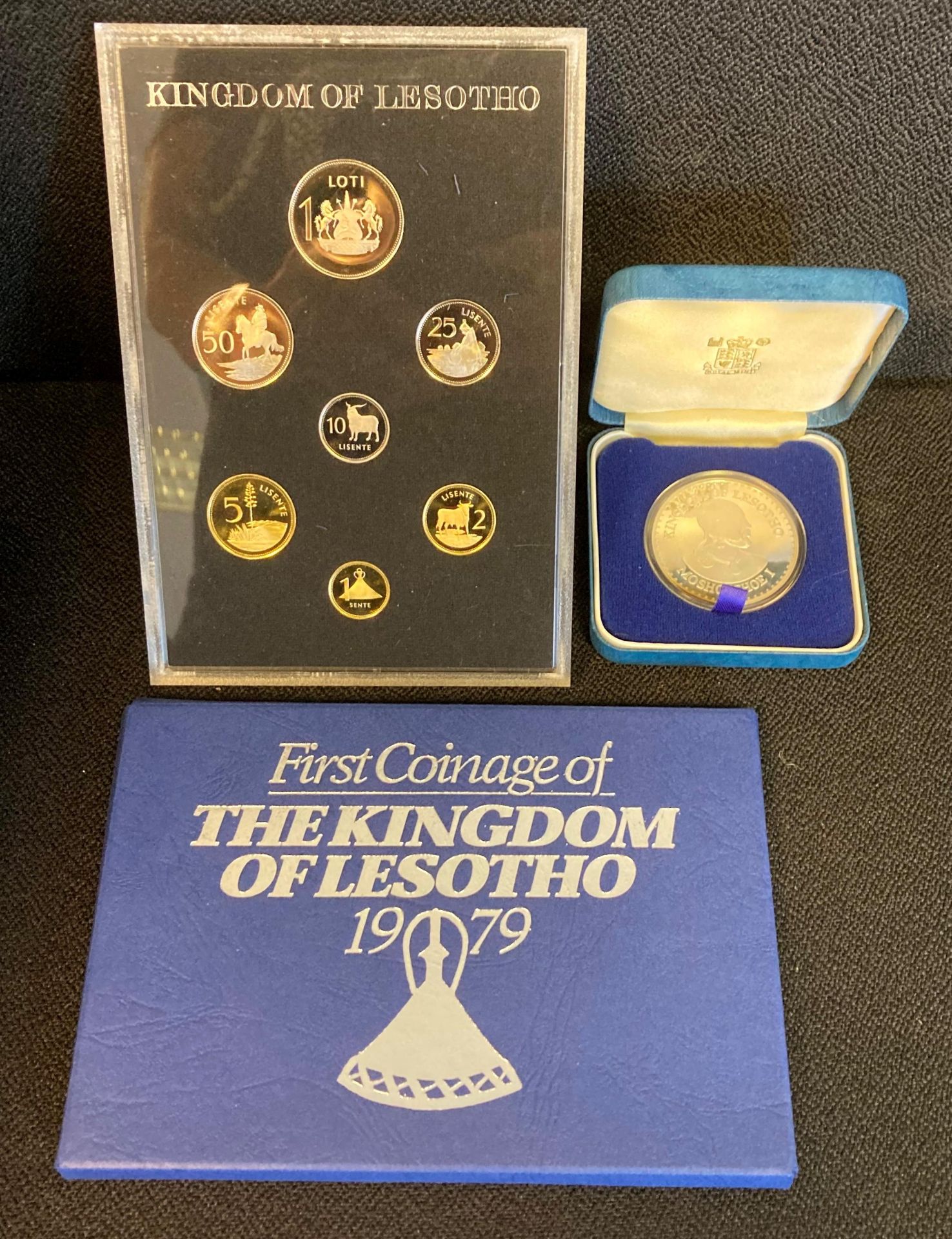 A Kingdom of Lesotho 50 Maloti 1980 Silver coin together with a First Coining of The Kingdom of