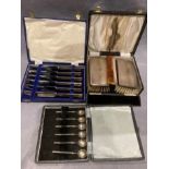 A cased silver back two piece clothes brush set,