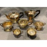 An LRS silver plate four piece tea service and a three piece plated tea service